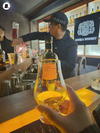 A glass of Nikka Coffey Grain Whisky, neat.