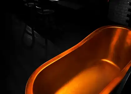 A golden bathtub in the middle of the speakeasy