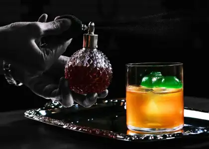 The Coco No. 5 is inspired by the Chanel No. 5, with a perfume jar of rosewater on the side