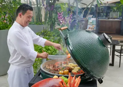 Chef Max from The Eight grilling barbecue