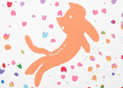 An orange cat surrounded by paint splatters