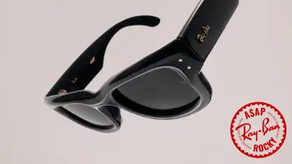 Black sunglasses against a neutral background