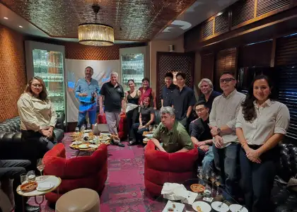 a group of people posing for a photo