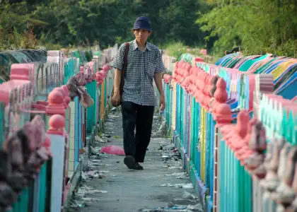 A man walking on a bridge