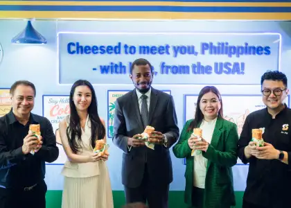 People holding a sandwich