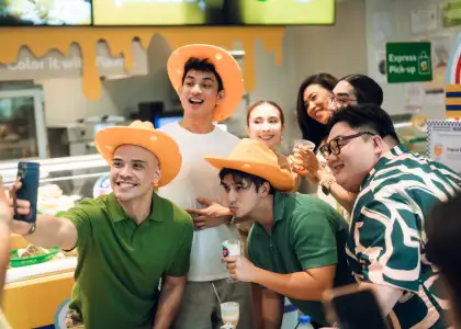 People smiling at a camera