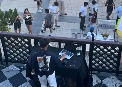 DJ playing at day rave held at Murray House, Stanley for Murray Summer event