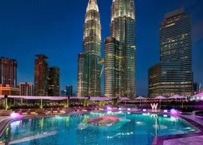 w kuala lumpur pool with the overseeing petronas tower