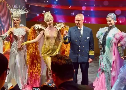 StarCruises’ “Star Voyager” ship captain alongside entertainment team for photo