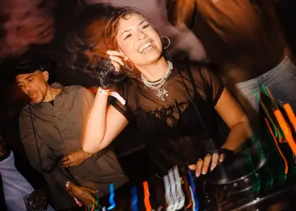 DJ Nems on the deck at The Trilogy's party