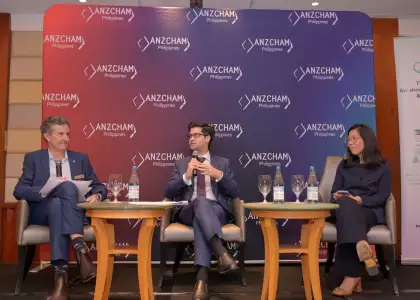 The speakers and moderator of the event