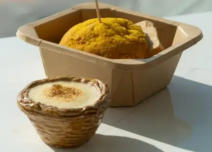 A coffee eggnog with a bread bun