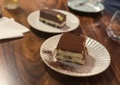 Tobler & Torrone Milk Chocolate Pave (top); Odette’s Tiramisu (below) at Nocino Hollywood Road