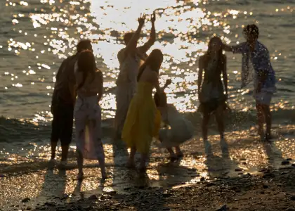 A group of people on the beach