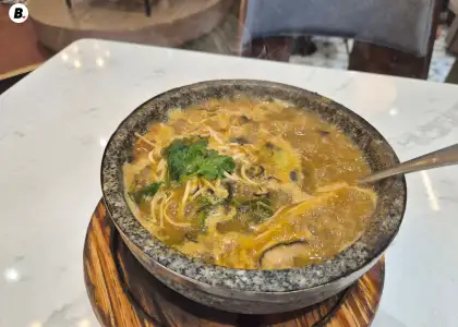 A Creative flavor bomb mixing Thai Tom Yum and Filipino Sinigang