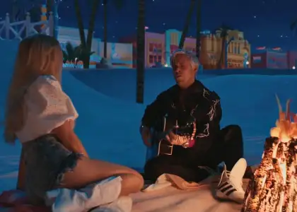 Ken playing the guitar at Barbie, The Barbie Movie (2023)