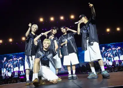 The five members of TXT on their Dallas stop