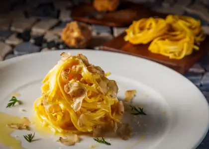 Pasta with butter, parmesan cheese, and white truffle