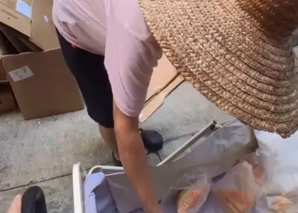 Screenshot of her reel, where she distributed meals to those in need