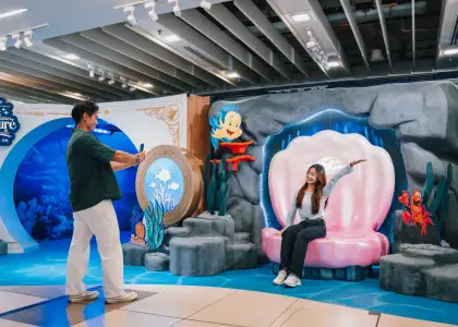 Person posing at the Ariel photo spot