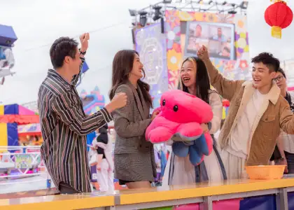 Friends enjoying some of the carnival games