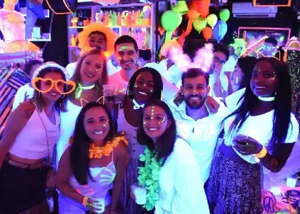 Chalk Party neon-lit venue with guests