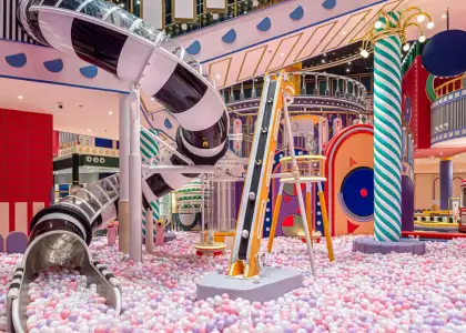 A children's playground with plastic balls