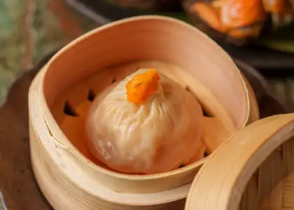 A xiao long bao with crab roe