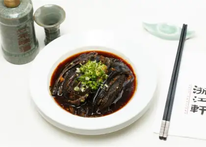 Seared swamp eel in a brown sauce