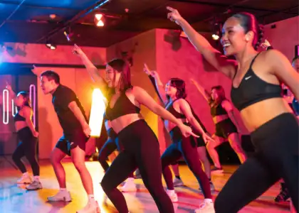 A photo of a fitness dance class session