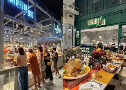 A photo of people lining up at a buffet table at The Alley by Vikings