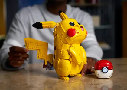 A photo of Pikachu and Poké Ball