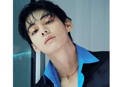 A photo of BTS' V wearing a choker