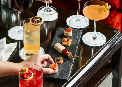 A photo of cocktails and cold-cuts sampler