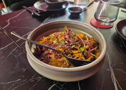 Beef with rice noodles in a bowl