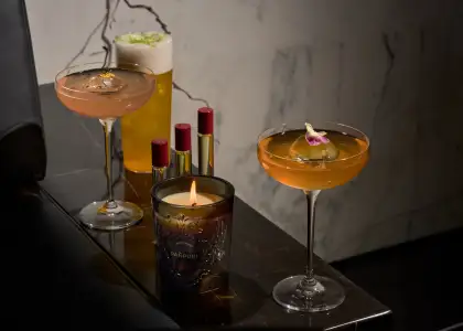 A line of signature cocktails and small perfume bottles
