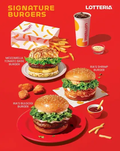 Burgers, fries, and sides on a red background