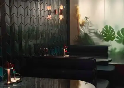 A cool green background with booths