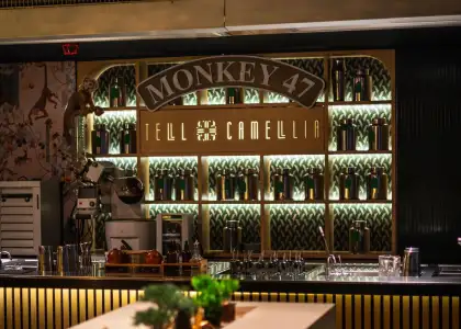 A warmly lit interior with a mirror in the back