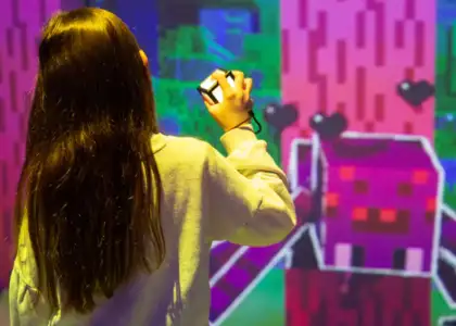 A girl holding an Orb of Interaction