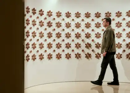 A photo of Albert Yonathan Setyawan in his ceramic installation