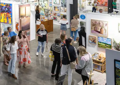 People looking through art gallery exhibitions at Affordable Art Fair Hong Kong 2025