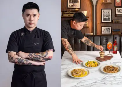 A chef wearing a black chef's uniform and some Italian dishes