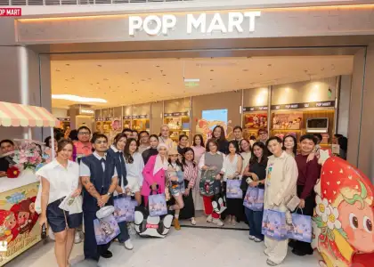 People in front of a POP MART store