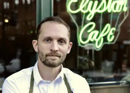 Steve Schneider in front of Elysian Cafe in Hoboken, New Jersey