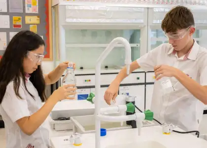 Students studying science in lab environment at Kellett School - best Hong Kong International Schools - The Beat Asia