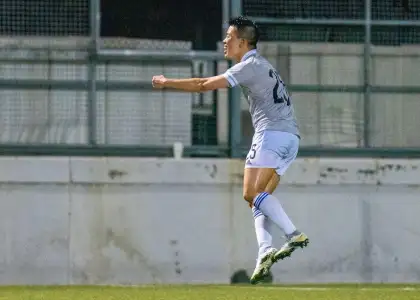 Emery Fung playing football at the Gay Games Hong Kohng