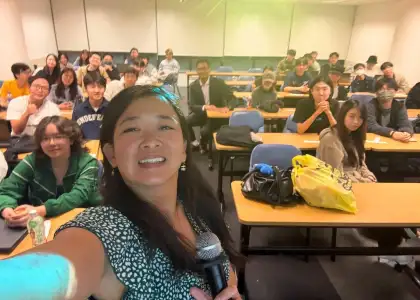 Photo of Chi Lo, Sustainable Business Manager of Saiyuen Camping Adventure lecturing at a university
