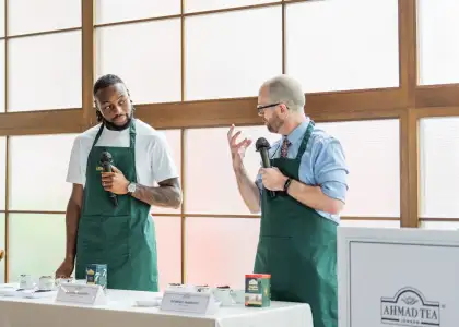Manchester City star football player Antoine Semenyo and Senior Tea Taster Dominic Marriott at Ahmad Tea event in Hong Kong