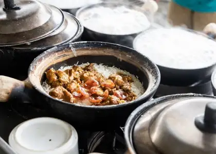 Steamy hot clay pot chicken rice being cooked in r 2021 09 01 22 35 53 utc